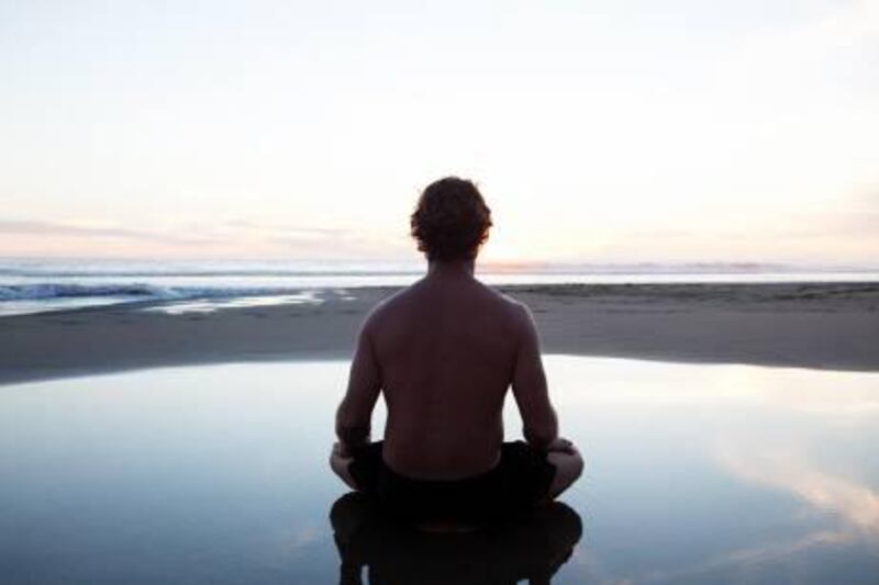 Meditation can help calm the mind and body. Russell Monk / Getty Images