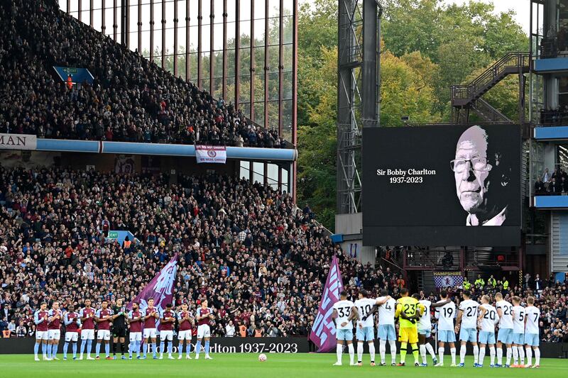 Players and fans observe a minute's applause for late England and Manchester United midfield great Bobby Charlton. AFP
