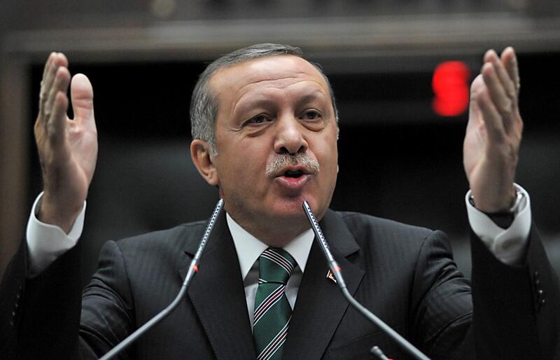 Turkey's prime minister, Recep Tayyip Erdogan, addresses legislators from his ruling Justice and Development Party (AKP) during a meeting at the Turkish parliament in Ankara on November 19, 2013. Adem Altan/AFP