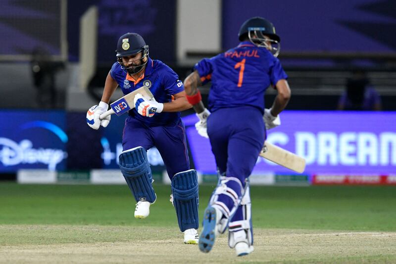 India's Rohit Sharma and KL Rahul run between the wickets. AFP