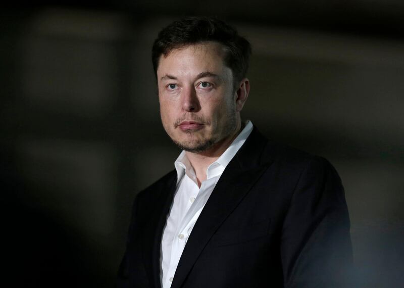 FILE- In this June 14, 2018, file photo, Tesla CEO and founder of the Boring Company Elon Musk speaks at a news conference in Chicago. The Securities and Exchange Commission has asked a federal court to oust Musk as Tesla's chairman and CEO, alleging he committed securities fraud with false statements about plans to take the company private.   (AP Photo/Kiichiro Sato, File)