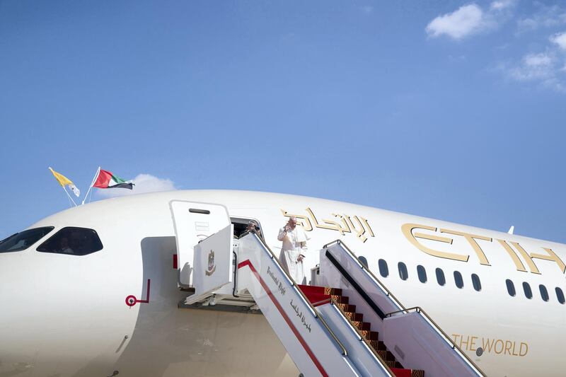 ABU DHABI, UNITED ARAB EMIRATES - February 05, 2019: Day three of the UAE Papal visit - His Holiness Pope Francis, Head of the Catholic Church bids farewell as he boards an Etihad Airways flight, at the Presidential Airport. 


( Mohamed Al Hammadi / Ministry of Presidential Affairs )
---