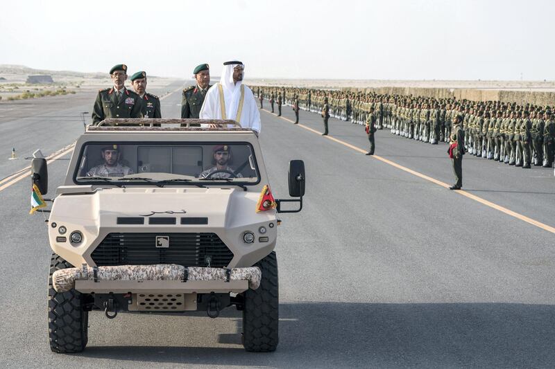 ZAYED MILITARY CITY, ABU DHABI, UNITED ARAB EMIRATES - November 28, 2017: HH Sheikh Mohamed bin Zayed Al Nahyan Crown Prince of Abu Dhabi Deputy Supreme Commander of the UAE Armed Forces (4th L), inspects the cadets during a graduation ceremony for the 8th cohort of National Service recruits and the 6th cohort of National Service volunteers at Zayed Military City. Seen with HE Lt General Hamad Thani Al Romaithi, Chief of Staff UAE Armed Forces (L) and Brigadier Faisal Mohamed Al Shehhi (3rd L).

( Hamad Al Kaabi / Crown Prince Court - Abu Dhabi )
—