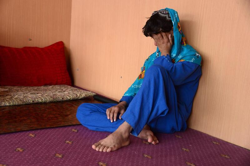 File photo of an Afghan boy, who was held as a child sex slave, sitting at a restaurant in a unidentified location in Afghanistan. The country is set to lay out stringent penalties for "bacha bazi" – or sexual slavery and abuse of boys – for the first time in a landmark move against the deeply entrenched practice. Aref Karimi/AFP

