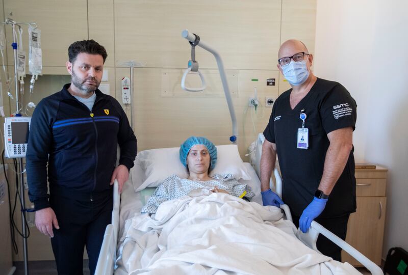 Ms Al Essa, a Syrian quake survivor with her husband and doctor, Dr. Marcelo Ribeiro Jr. at Sheikh Shakbout Medical City, Abu Dhabi.  Leslie Pableo for The National