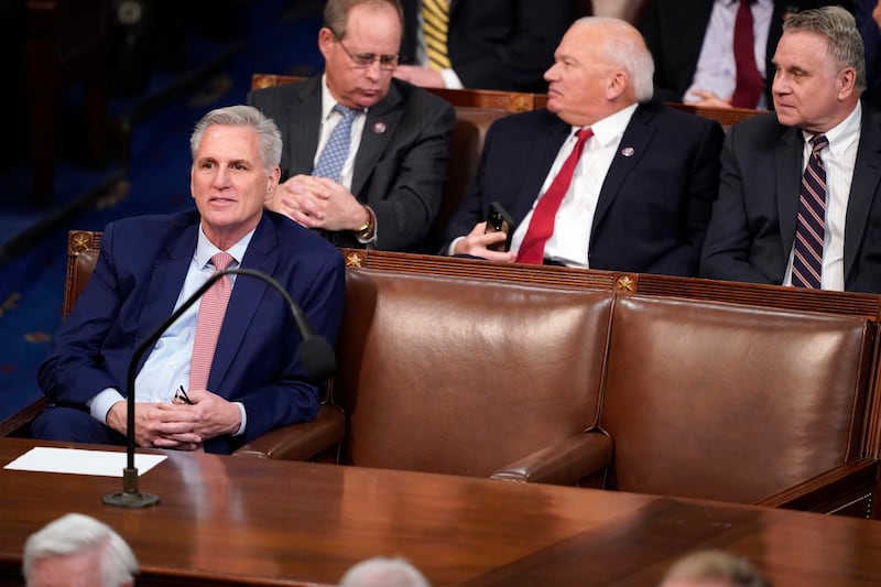 Mr McCarthy listens to the third round of votes for House speaker on the opening day of the 118th Congress. AP