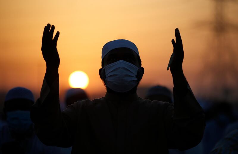 A worshipper at the Eid musallah in the Nad Al Hammar district of Dubai. EPA