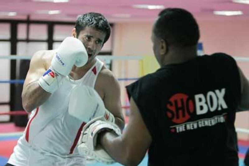 UAE boxer Eisa al Dah training with his coach Anthony "Chill" Wilson.