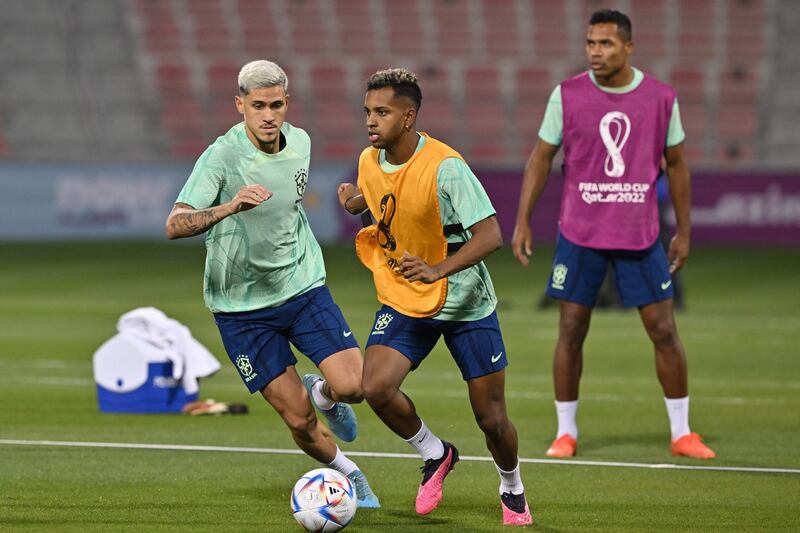 Pedro, left, and Rodrygo take part in a training session at the Al Arabi SC Stadium. AFP