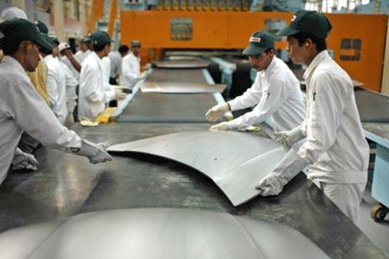 Employees produce hoods at the new Honda Siel Cars India plant in Tapukara, Rajasthan. The state has become a hub of economic activity, expanding from agriculture to manufacturing and technology.