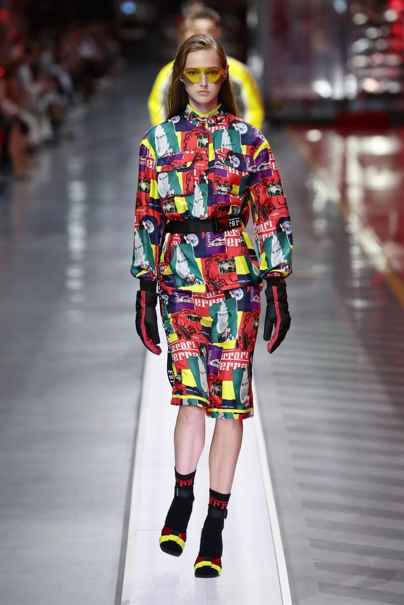 A model walks the runway at the fashion debut of the first co-ed Ferrari collection at Ferrari Factory on June 13, 2021 in Maranello, Italy. Getty Images