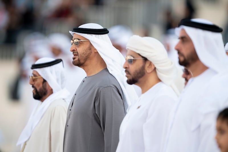 Sheikh Mohamed; Sheikh Tahnoon bin Mohamed, Ruler's Representative in Al Ain Region; Sheikh Hamdan bin Zayed, Ruler’s Representative in Al Dhafra Region; and Lt Gen Sheikh Saif bin Zayed, Deputy Prime Minister and Minister of Interior, stand for the national anthem. Hamad Al Kaabi / Presidential Court 
