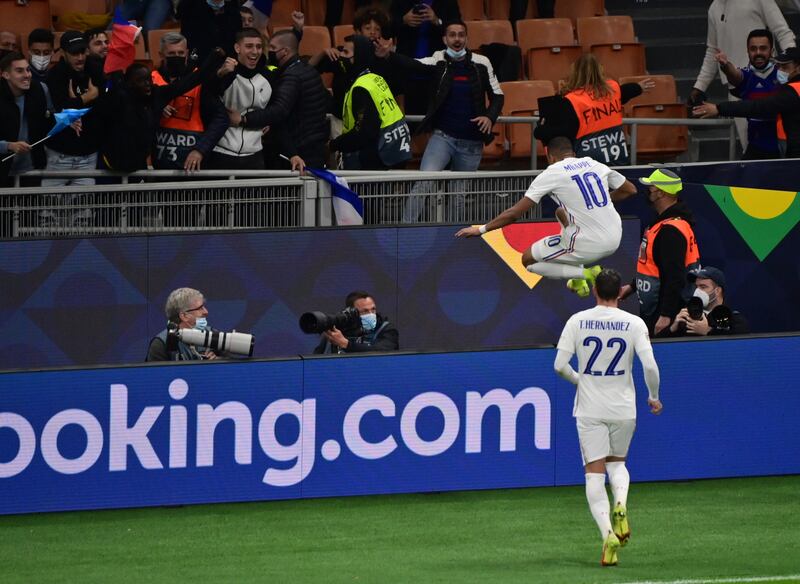 Mbappe celebrates the winner. AP