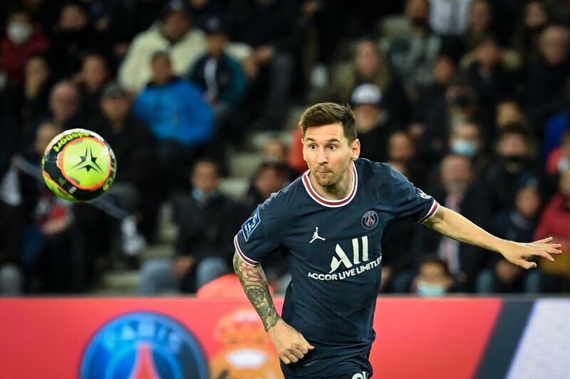 Paris Saint-Germain's Argentinian forward Lionel Messi watches the ball. AFP