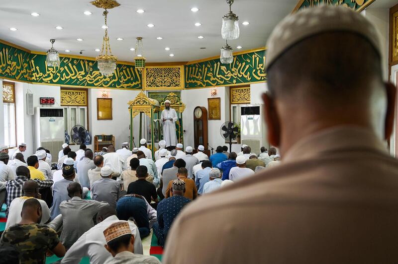 Muslim devotees attending Friday noon prayers in Haroon mosque in Bangkok. AFP