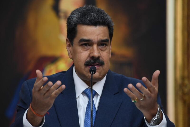 (FILES) In this file photo taken on February 14, 2020, Venezuela's President Nicolas Maduro speaks during a press conference with members of the foreign media at Miraflores Palace in Caracas. The US Justice Department is planning to indict Venezuelan President Nicolas Maduro for "narco-terrorism," US Senator Marco Rubio said on March 26, 2020. The Florida senator confirmed in a brief tweet US media reports that the department will unveil charges accusing the Venezuelan leader and other senior members of his government of conspiring with drug cartels. / AFP / YURI CORTEZ
