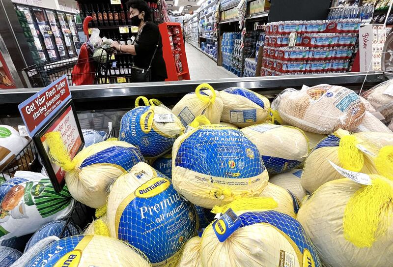 Turkeys are displayed for sale in a grocery store before the Thanksgiving holiday. AFP