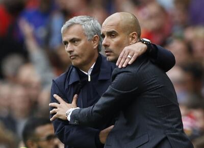Jose Mourinho, left, and Pep Guardiola, who will be under pressure to improve the fortunes of their respective Manchester clubs this season, may also want to get one up on each other. Agencies