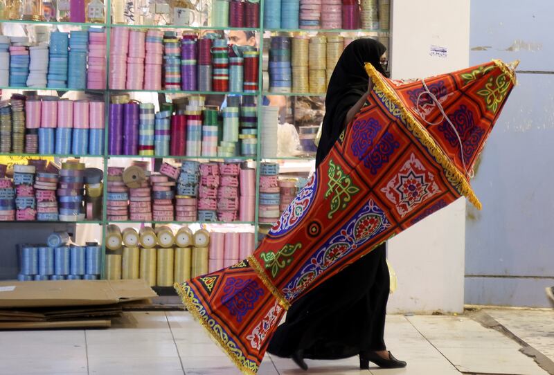 A woman shops for Ramadan decorations, in Riyadh, Saudi Arabia. Reuters