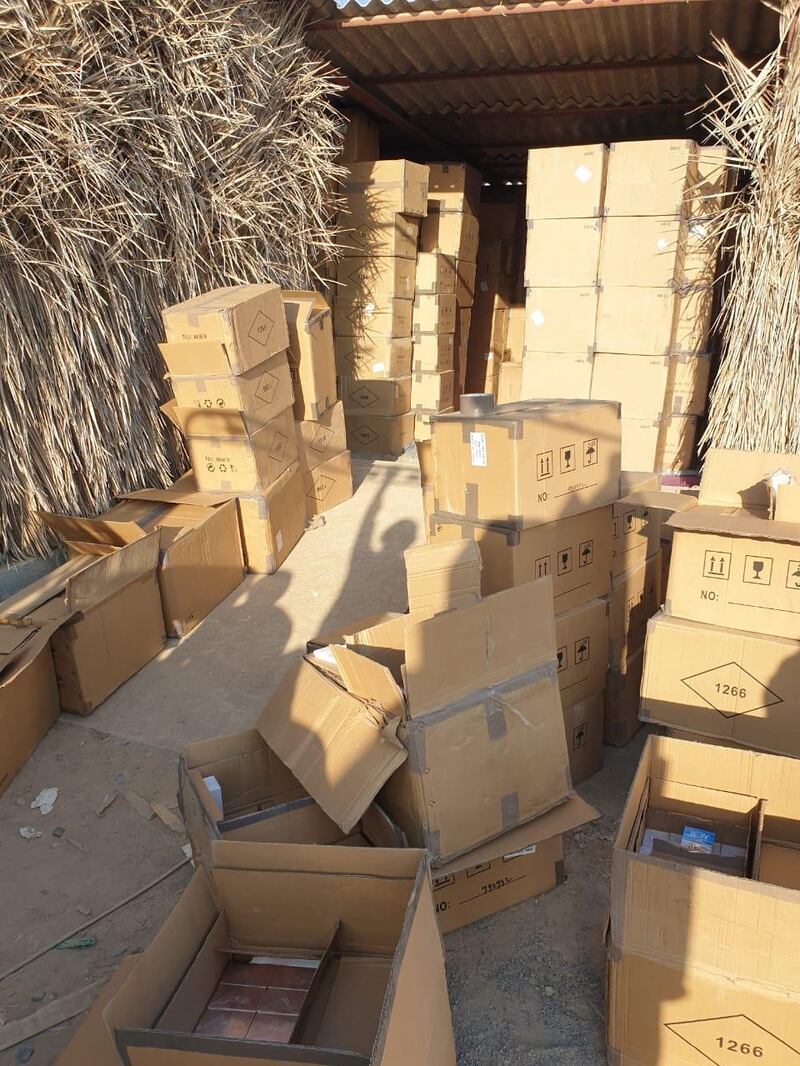 The Legal Group's intellectual property division, together with enforcement authorities of Ras Al Khaimah, conducted a massive raid action on counterfeit branded perfumes. Courtesy TLG 