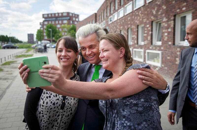 Mr Wilders with supporters in The Hague in 2014. AP