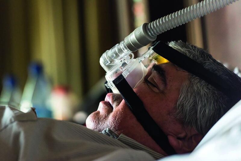 One of the common treatments for sleep apnoea is use of a machine that delivers air through a mask placed over the nose. Getty 