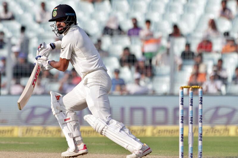 India's Shikhar Dhawan bats during the fourth day of their first test cricket match against Sri Lanka in Kolkata, India, Sunday, Nov. 19, 2017. (AP Photo/Bikas Das)