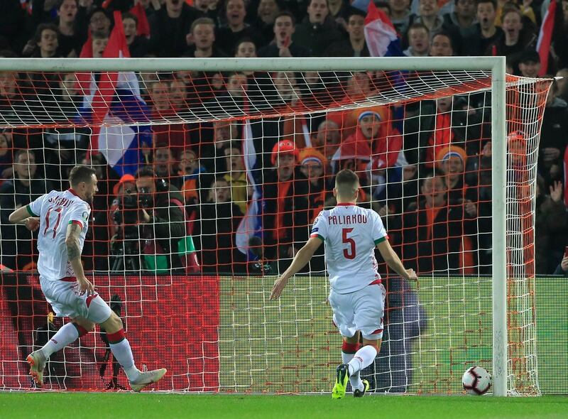 Sivakov, left, and Belarus' Denis Polyakov fail to stop a shot as Netherlands' Memphis Depay scores the opening goal. AP Photo