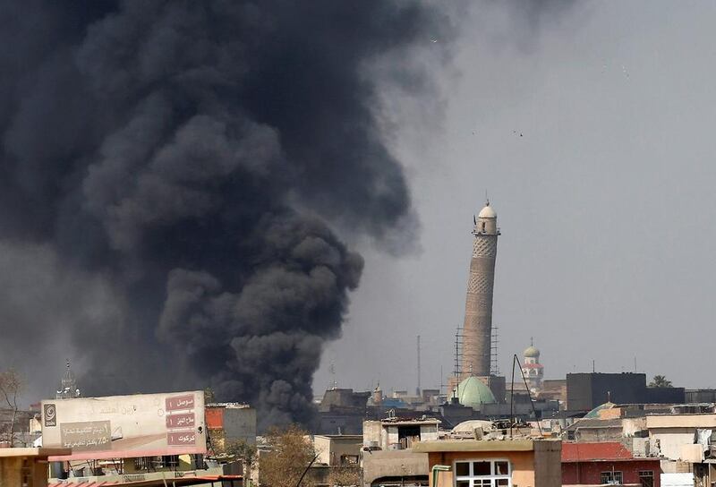 Turmoil from the the conflict with ISIS and volatility of oil prices has negatively impacted Iraq's economy the IMF says. Youssef Boudlal / Reuters