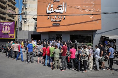 Crowds queue for bread at a bakery in Beirut in June. A perfect storm of job losses and rising food prices has left many struggling. Hasan Shaaban / Bloomberg via Getty Images