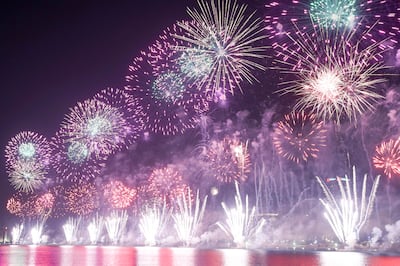 Grand fireworks light up the night sky along Abu Dhabi's Corniche for UAE at 50 celebrations in Abu Dhabi. Khushnum Bhandari / The National