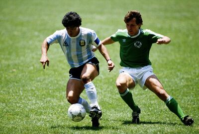 Diego Maradona of Argentina and Lothar Matthaeus of Germany in action during the FIFA World Cup final on 29 June 1986 against West Germany at the Azteca Stadium in Mexico City, Mexico. Argentina won the match 3-2. (Photo by Michael King/Getty Images)  
