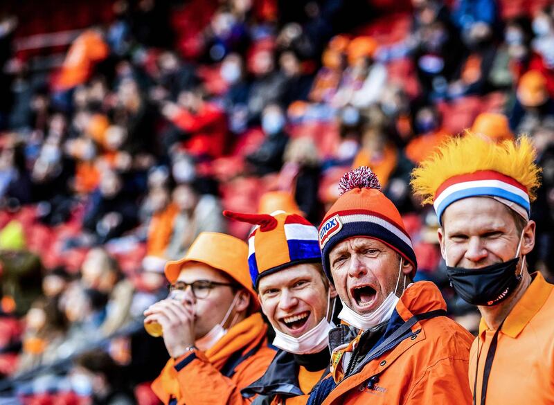 Dutch fans cheer on their side. AFP