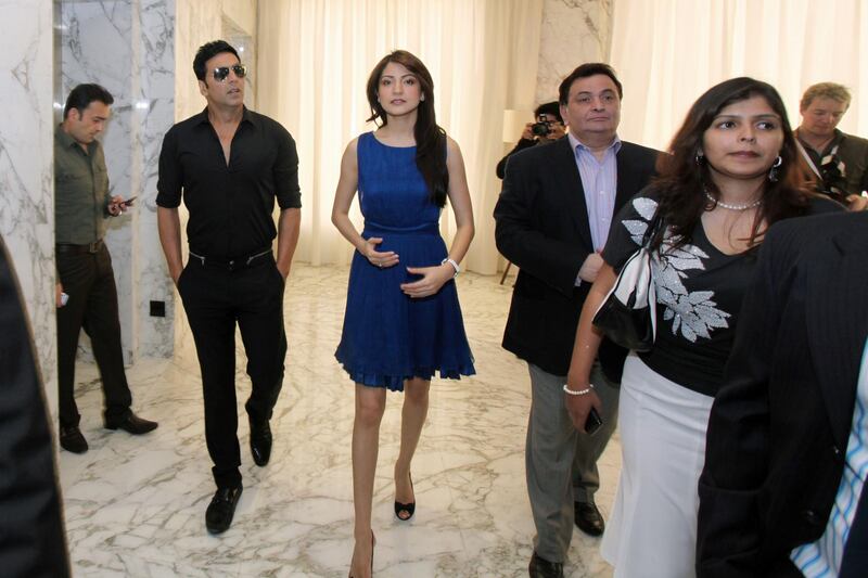 DUBAI, UNITED ARAB EMIRATES - FEBRUARY 9:  From left: Bollywood stars Akshay Kumar, Anushka Sharma, and Rishi Kapoor arrive at a press conference to launch the opening of their new film, Patiala House, at Le Meridien Hotel in Dubai on February 9, 2011.  (Randi Sokoloff for The National)  For News story by Ramola