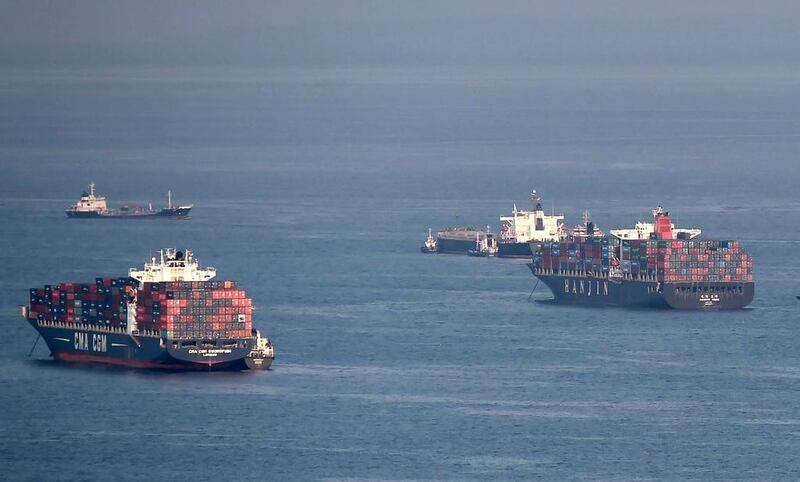 Current delays in unloading cargo are incurring more than US$2 million in charter fees daily, a South Korean judge says. Roslan Rahman / AFP