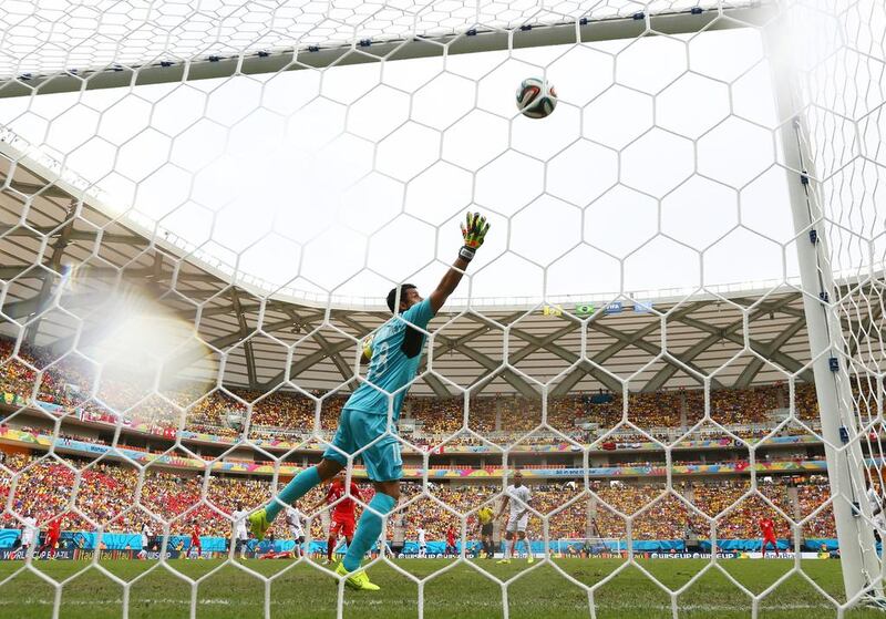 Xherdan Shaqiri of Switzerland scores his team's first goal past goalkeeper Noel Valladares of Honduras during their match on Wednesday at the 2014 World Cup in Manaus, Brazil. Matthew Lewis / Getty Images