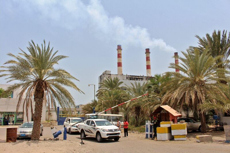Workers returning to their jobs at Al Haswa thermoelectric power station in the outskirts of the southern Yemeni city of Aden.   AFP