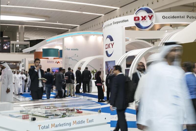 The Total Marketing Middle East stand at Adipec. Total, its parent company, said it had taken on a larger part of Abu Dhabi’s onshore Bab oil concession. Mona Al Marzooqi / The National