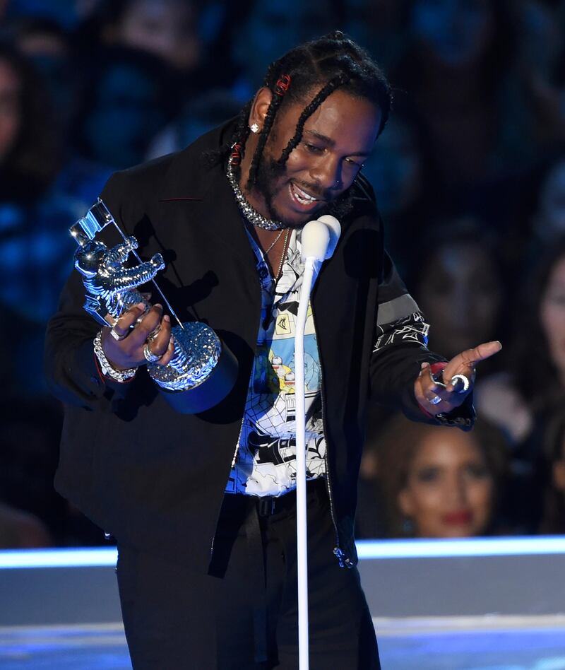 Kendrick Lamar accepts the award for video of the year for "HUMBLE." at the MTV Video Music Awards at The Forum on Sunday, Aug. 27, 2017, in Inglewood, Calif. (Photo by Chris Pizzello/Invision/AP)