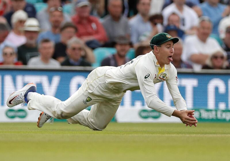 Marnus Labuschagne takes a diving catch to dismiss Jos Buttler. Getty