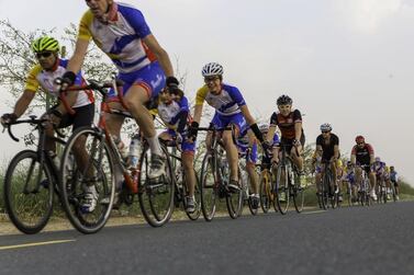 Cyclists take part in an event in the UAE. 