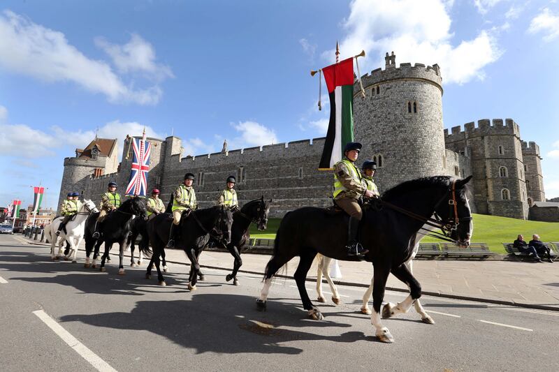 WINDSOR, UK Monday 29th April 2013. The Household Cavalry walk the route past Windsor Castle today (monday) of President Khalifa's state carriage procession with The Queen and The Duke of Edinburgh   on Tuesday 30th April. Stephen Lock for The National