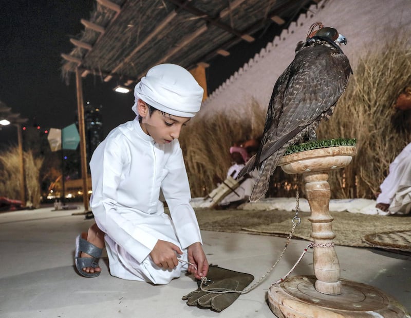 Abu Dhabi, United Arab Emirates, May 18, 2019. –  ‘Ramadan at Al Hosn’, which aims to revive the authentic traditions of Ramadan by recalling the memories rooted in our past, when the people of Abu Dhabi gathered at Qasr Al Hosn to celebrate the holy month. --  A boy falconer at Qasr Al Hosn.
Victor Besa/The National
Section:  NA
Reporter: