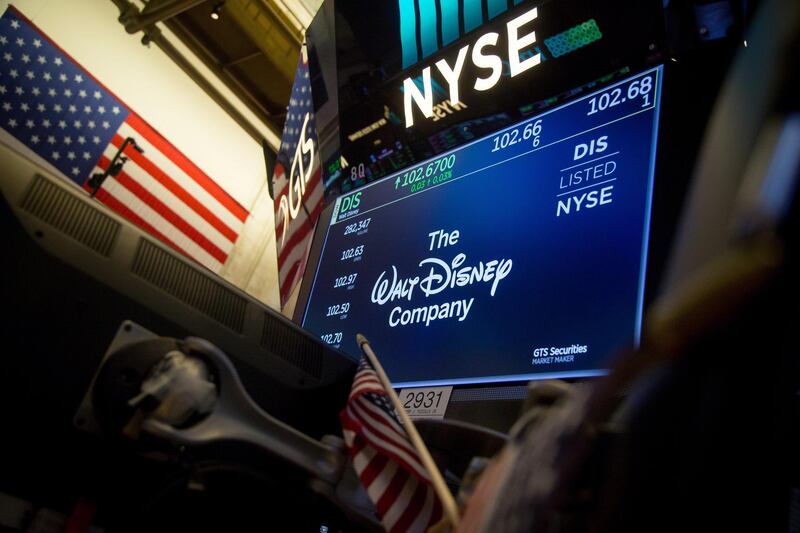 A monitor displays Walt Disney Co. signage on the floor of the New York Stock Exchange (NYSE) in New York, U.S., on Monday, Nov. 27, 2017. Most U.S. stocks advanced as investor focus returned to the American economy and tax legislation at the beginning of a week packed with potential market catalysts. Photographer: Michael Nagle/Bloomberg