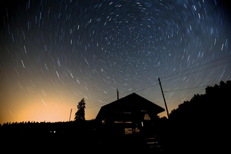 A long exposure image shows Stars revolving around the North Star during a 'Night of falling stars' on the Col de la Givrine), near Saint-Cergue, Switzerland. Salvatore Di Nolfi/EPA