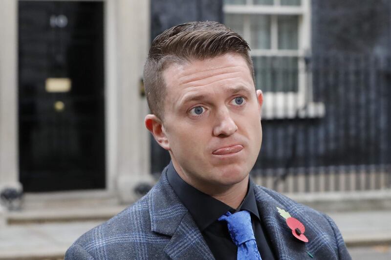 Founder and former leader of the anti-Islam English Defence League, Stephen Yaxley-Lennon, AKA Tommy Robinson, talks to the media after delivering a petition to 10 Downing Street in central London on November 6, 2018. The head of the UK Independence Party has appointed leading far-right activist Stephen Yaxley-Lennon, AKA Tommy Robinson, as a personal adviser, prompting UKIP's former leader Nigel Farage to call for his ouster amid accusations of Islamophobia. UKIP chief Gerard Batten told the BBC on November 23, 2018 that Yaxley-Lennon, a hugely divisive figure who founded the anti-Islam English Defence League, had been appointed as his adviser on "rape gangs and prison reform". / AFP / TOLGA AKMEN
