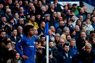 Chelsea's Brazilian midfielder Willian waits to take a corner kick during the English Premier League football match between Chelsea and Everton at Stamford Bridge in London on March 8, 2020. RESTRICTED TO EDITORIAL USE. No use with unauthorized audio, video, data, fixture lists, club/league logos or 'live' services. Online in-match use limited to 120 images. An additional 40 images may be used in extra time. No video emulation. Social media in-match use limited to 120 images. An additional 40 images may be used in extra time. No use in betting publications, games or single club/league/player publications. / AFP / Adrian DENNIS / RESTRICTED TO EDITORIAL USE. No use with unauthorized audio, video, data, fixture lists, club/league logos or 'live' services. Online in-match use limited to 120 images. An additional 40 images may be used in extra time. No video emulation. Social media in-match use limited to 120 images. An additional 40 images may be used in extra time. No use in betting publications, games or single club/league/player publications.