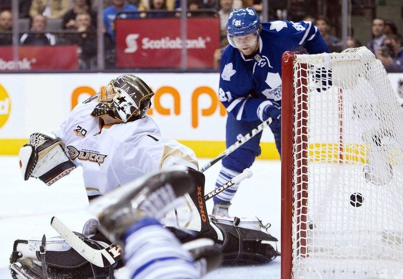 Phil Kessel scores one of his three goals on Tuesday night. Nathan Denette / AP / The Canadian Press