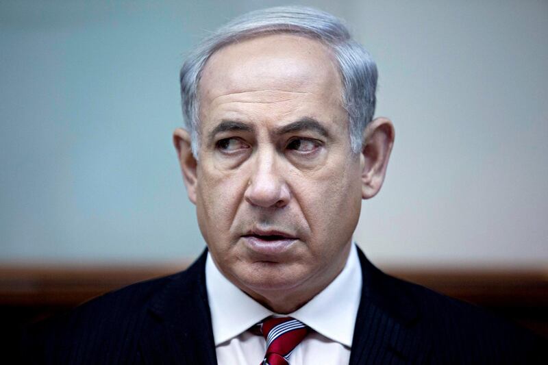 epa06522132 (FILE) -  Israeli Prime Minister Benjamin Netanyahu attends the weekly cabinet meeting in his Jerusalem office, Israel, 09 June 2013 (reissued 13 February 2018). According to media reports, Israeli Police published on 13 February 2018 its recommendations in the investigations in two corruption cases involving Prime Minister Benjamin Netanyahu and decided to indict him for bribery and breach of trust.  EPA/ABIR SULTAN