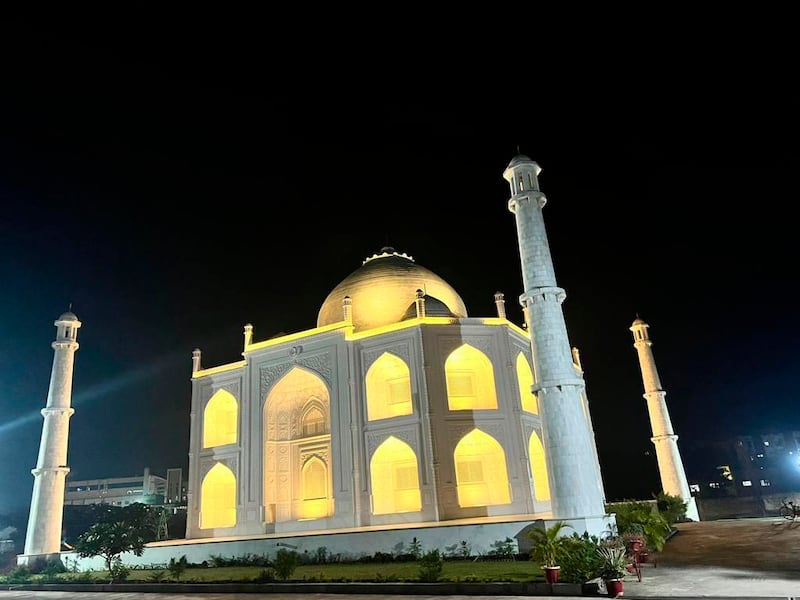 This undated photograph provided by Indian businessman Anand Prakash Chouksey shows a house resembling India’s iconic Taj Mahal monument built by Chouksey as a residence for him and his wife to live in at Burhanpur, Madhya Pradesh, India.  Constructed with white marble procured from Makrana, a city in Rajasthan state and the same place that gave the Taj Mahal its marble, the smaller imitation embodies several aspects of the real monument, including the large dome, intricate minarets and even artwork seen on the original.  ( Anand Prakash Chouksey via AP)